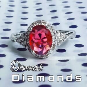 Oval Red Ruby Ring with Clusters of White Baguette Diamonds on 925 Silver
